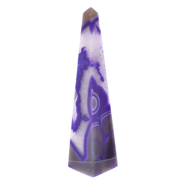 Obelisk made of natural agate gemstone with crystal quartz, artificially colored. The obelisk has a height of 23cm. Buy online shop.