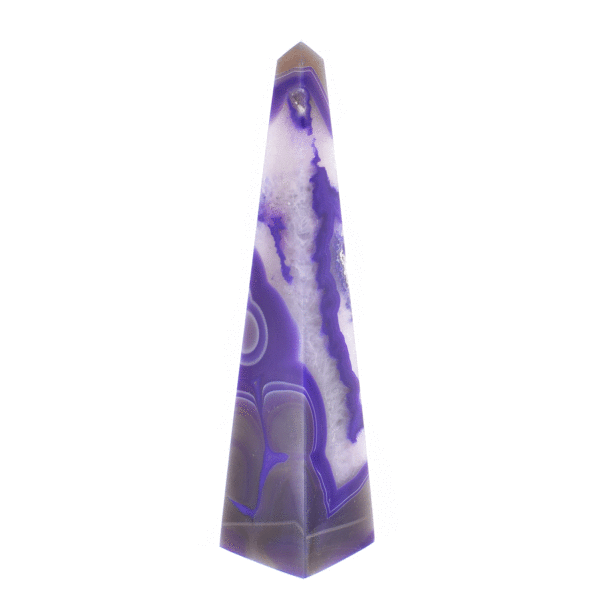 Obelisk made of natural agate gemstone with crystal quartz, artificially colored. The obelisk has a height of 23cm. Buy online shop.