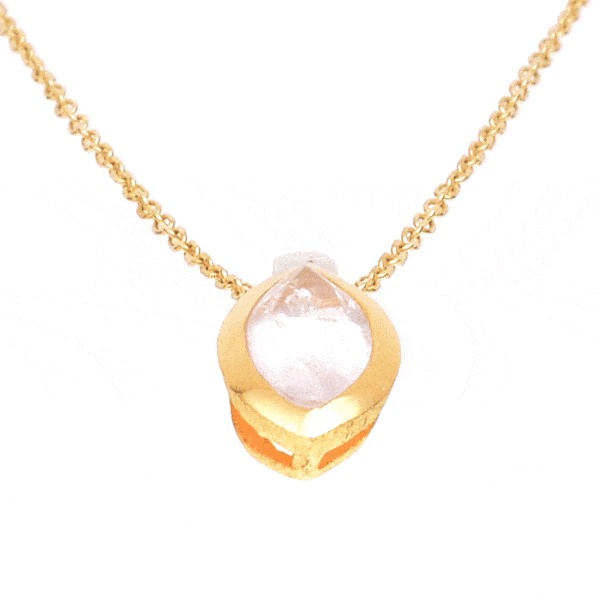 Handmade pendant made of sterling silver with gold plated bezel and natural rose quartz gemstone, in a marquise shape. The pendant is threaded on a gold plated sterling silver chain with adaptable length. Buy online shop.