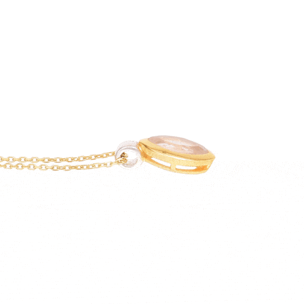 Handmade pendant made of sterling silver with gold plated bezel and natural rose quartz gemstone, in a marquise shape. The pendant is threaded on a gold plated sterling silver chain with adaptable length. Buy online shop.