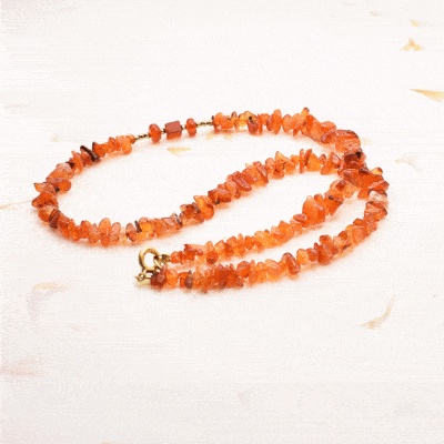 Handmade necklace made of natural carnelian and pyrite gemstones and gold plated sterling silver clasp. Buy online shop.