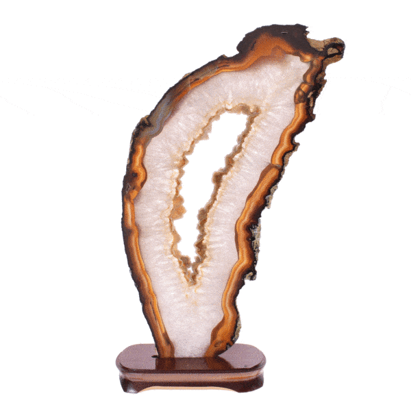 Polished slice of natural agate gemstone with crystal quartz, placed on a wooden base. The product has a height of 50cm. Buy  online shop.