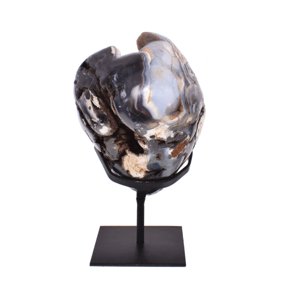 Natural agate geode gemstone with crystal quartz, placed on a black, metallic base. The product has a height of 23cm. Buy online shop.