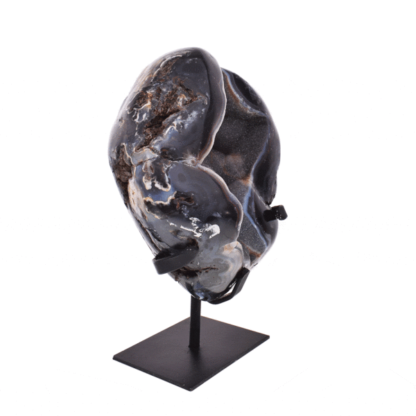 Natural agate geode gemstone with crystal quartz, placed on a black, metallic base. The product has a height of 23cm. Buy online shop.