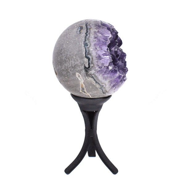 Sphere made of natural amethyst geode gemstone with a diameter of 8.5cm. The sphere comes with a black, metallic base. Buy online shop.