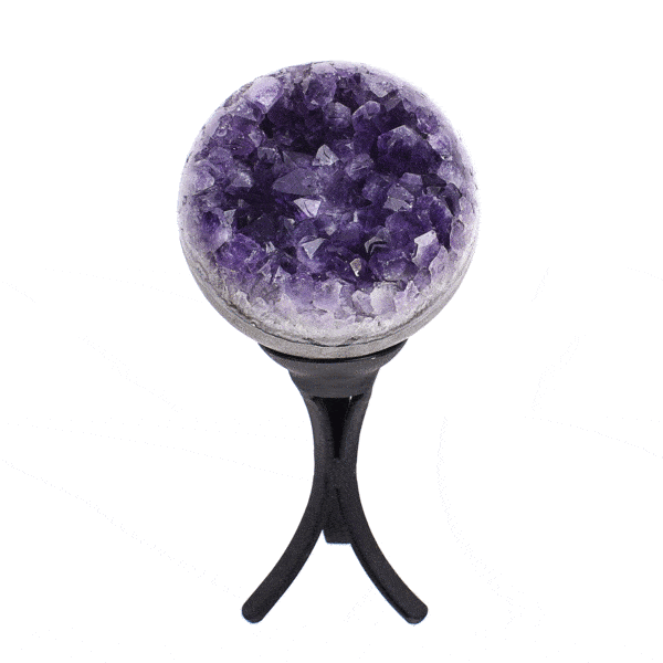 Sphere made of natural amethyst geode gemstone with a diameter of 8.5cm. The sphere comes with a black, metallic base. Buy online shop.