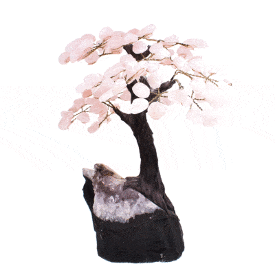 Handmade tree with polished leaves made of natural rose quartz gemstones and raw amethyst gemstone base. The tree has a height of 23cm. Buy online shop.