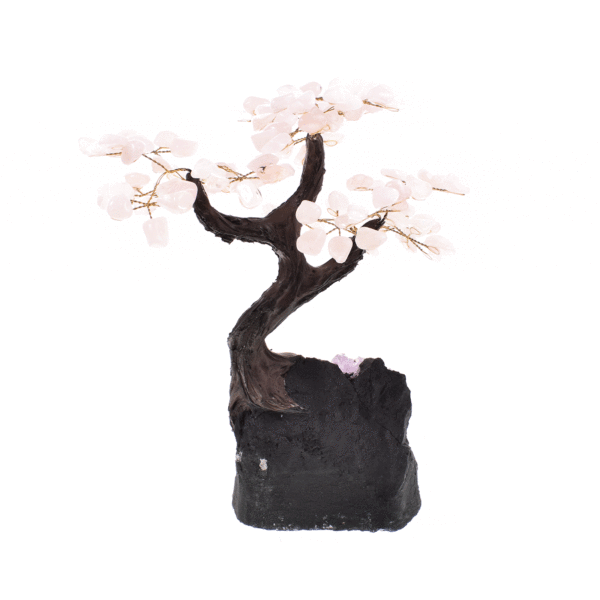 Handmade tree with leaves of natural baroque rose quartz gemstones and natural amethyst base. The tree has a height of 27cm. 