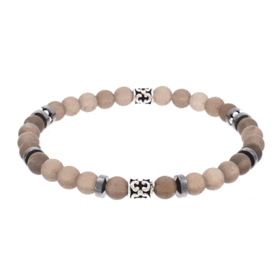 Handmade bracelet with natural smoky quartz and hematite gemstones, threaded on a special elastic. The bracelet is decorated with sterling silver elements.Buy online shop.