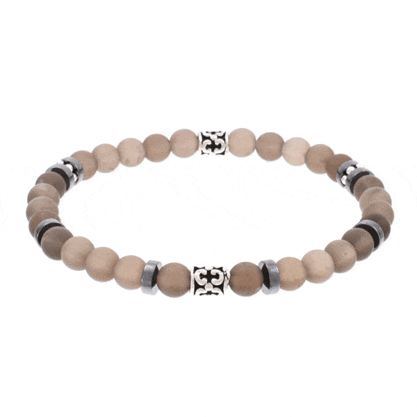 Handmade bracelet with natural smoky quartz and hematite gemstones, threaded on a special elastic. The bracelet is decorated with sterling silver elements.Buy online shop.