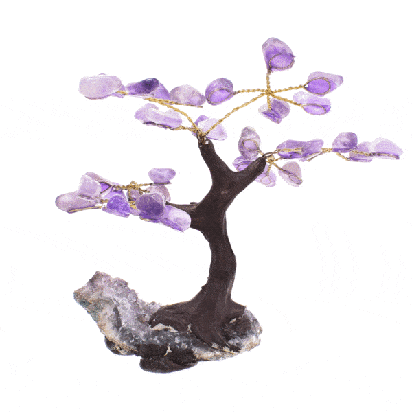 Handmade tree with natural polished amethyst gemstone leaves and raw amethyst base. The tree has a height of 10cm. Buy online shop.