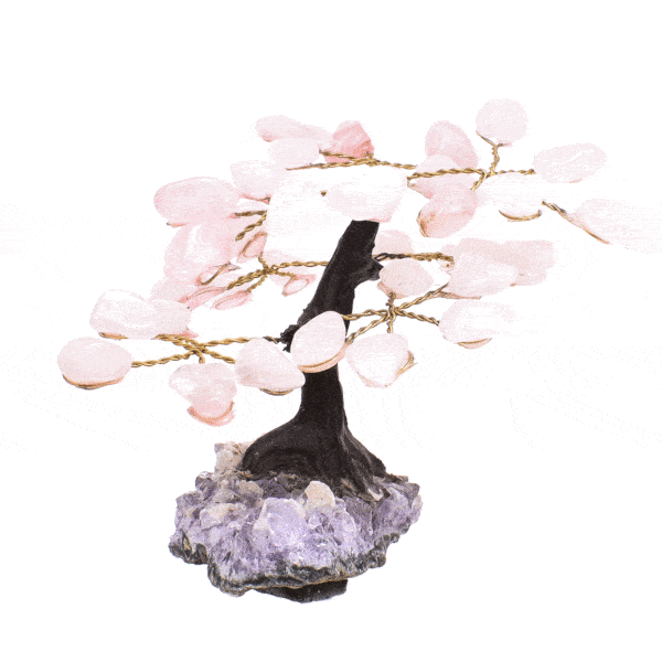 Handmade tree with polished leaves made of natural rose quartz gemstones and raw amethyst gemstone base. The tree has a height of 9cm. Buy online shop.