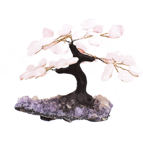 Handmade tree with polished leaves made of natural rose quartz gemstones and raw amethyst gemstone base. The tree has a height of 9cm. Buy online shop.