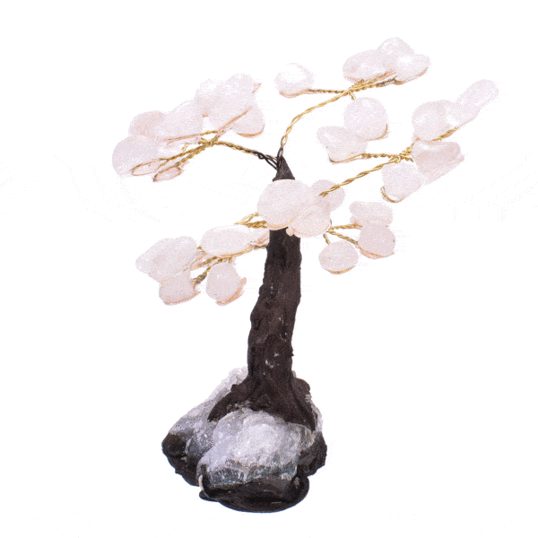 Handmade tree with polished leaves made of natural rose quartz gemstones and raw amethyst gemstone base. The tree has a height of 10cm. Buy online shop.