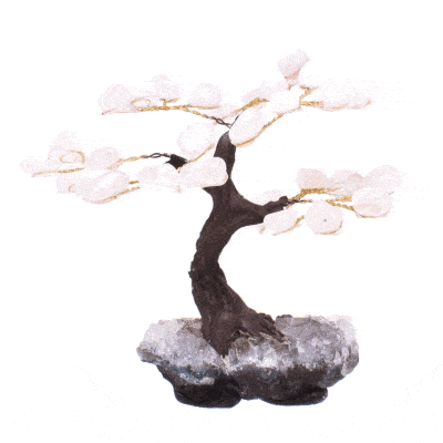 Handmade tree with polished leaves made of natural rose quartz gemstones and raw amethyst gemstone base. The tree has a height of 10cm. Buy online shop.