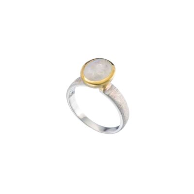 Handmade sterling silver ring with natural, oval-shaped, white labradorite gemstone. The ring has textured band and gold plated bezel. 
