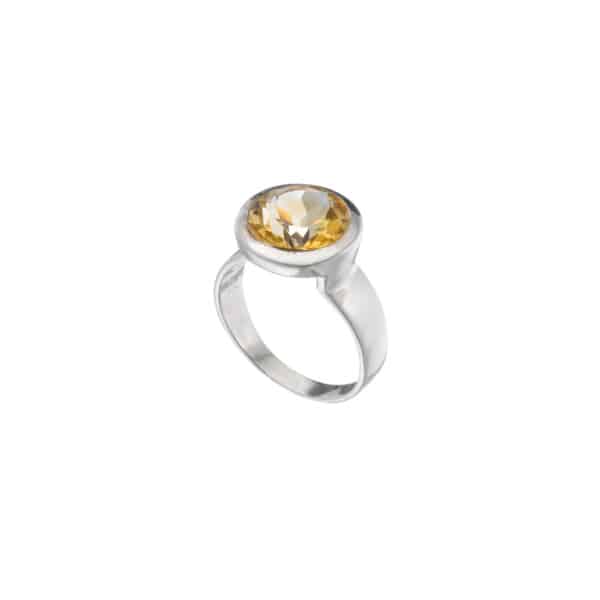 Handmade ring made of sterling silver and natural citrine quartz gemstone in a round shape. Buy online shop.