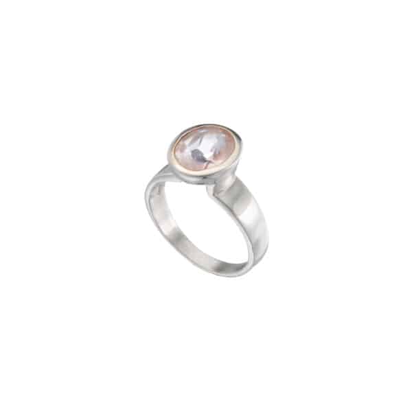 Handmade ring made of sterling silver and natural rose quartz gemstone in an oval shape. Buy online shop.