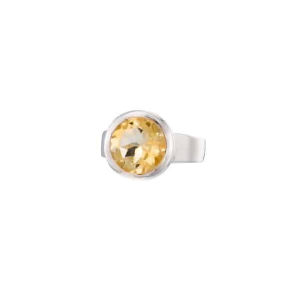 Handmade ring made of sterling silver and natural citrine quartz gemstone in a round shape. Buy online shop.