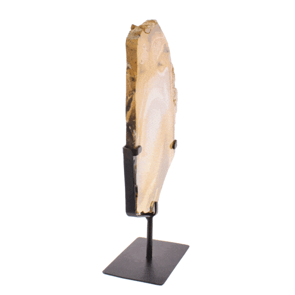 Polished piece of natural yellow moookaite jasper gemstone, placed on a black, metallic base. The product has a height of 32cm. Buy online shop.