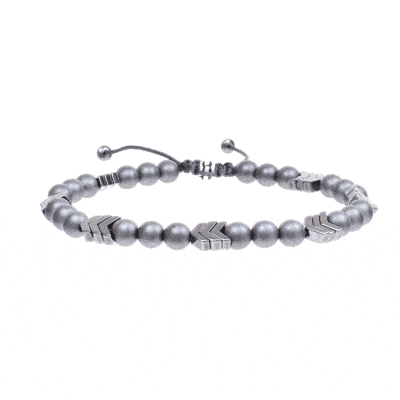 Handmade macrame bracelet with natural hematite gemstones in a spherical and arrow shape. The stones are threaded on a grey string and the bracelet has one decorative sterling silver element. Buy online shop.