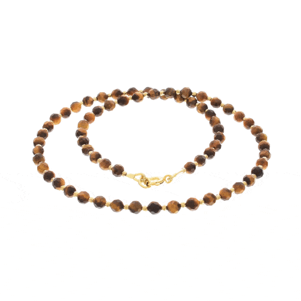 Handmade necklace with natural, faceted tiger's eye and pyrite gemstones. The necklace has a clasp made of gold plated sterling silver. Buy online shop.