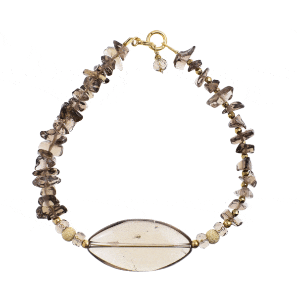 Handmade bracelet with natural smoky quartz and pyrite gemstones in an irregular, oval and spherical shape. The bracelet has a clasp and decorative elements made from gold plated sterling silver. Buy online shop.