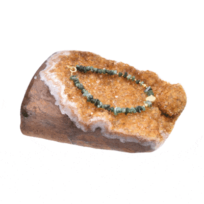 Handmade bracelet with small, polished pieces of natural emerald gemstone in an irregular shape and faceted pyrite gemstones in a spherical shape. The bracelet has decorative elements and clasp made from gold plated sterling silver. Buy online shop.