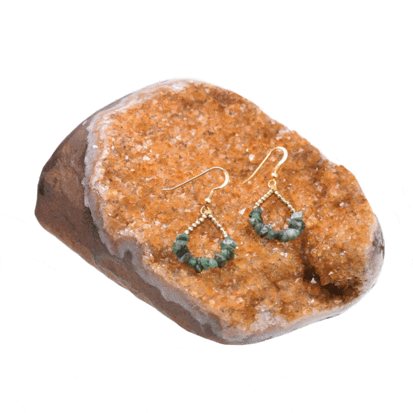 Handmade, teardrop shaped earrings made of gold plated sterling silver and natural emerald and pyrite gemstones in an irregular and spherical shape. Buy online shop.