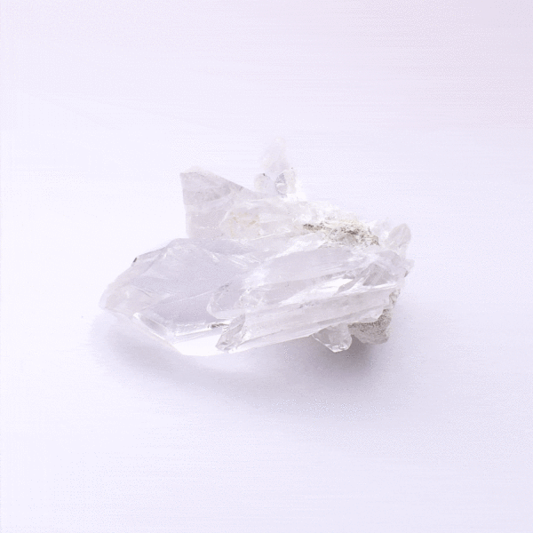 A raw 6cm piece of natural crystal quartz cluster. 