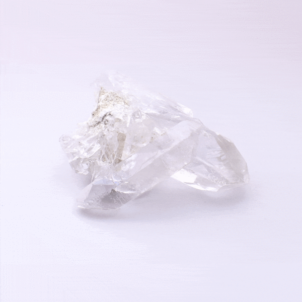A raw 6cm piece of natural crystal quartz cluster. 