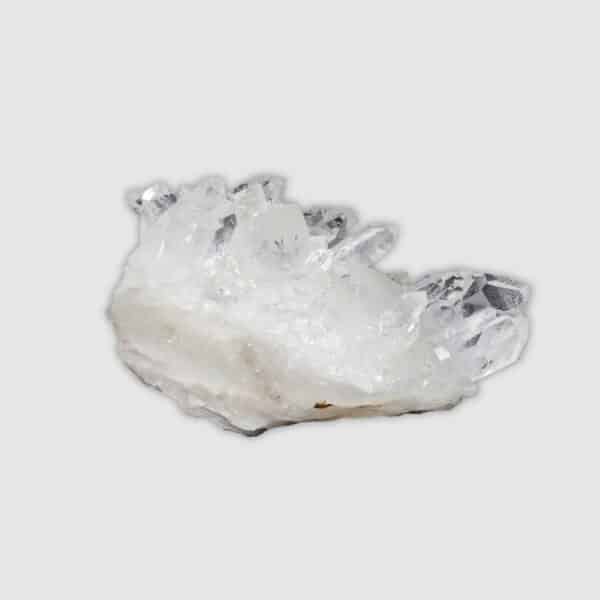 Raw 10cm piece of natural crystal quartz cluster. Buy online shop.