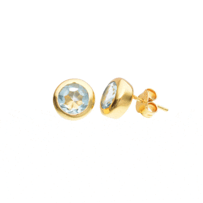 Handmade stud earrings made of gold plated sterling silver and faceted, natural blue topaz gemstone in a round shape. Buy online shop.