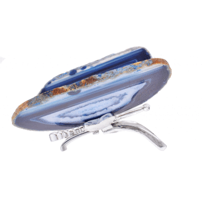 Butterfly with silver plated metallic body and wings made from polished slices of natural blue agate gemstone. The butterfly has a size of 13cm. Buy online shop.