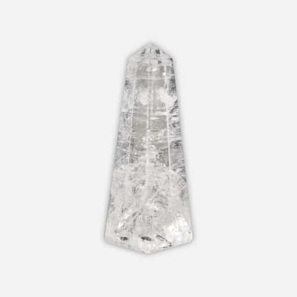 Obelisk made from natural crystal quartz gemstone, with a height of 10cm. Buy online shop.