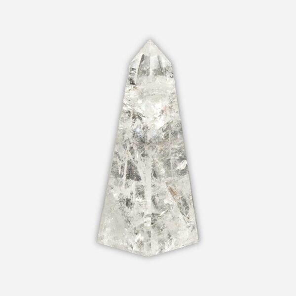 Obelisk made from natural crystal quartz gemstone, with a height of 9cm. Buy online shop.