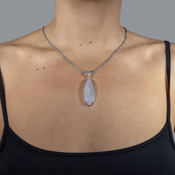 Handmade sterling silver pendant with natural marquise shaped white labradorite  gemstone. The pendant is threaded on a sterling silver chain. Buy online shop.