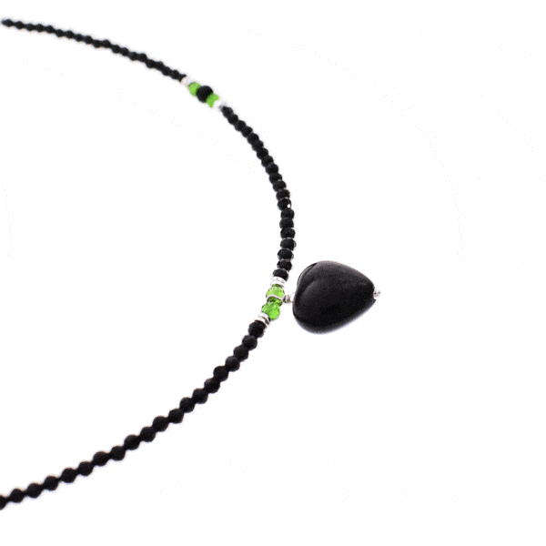 Handmade necklace with natural spherical shaped black spinel and dioptase gemstones and decorative sterling silver elements. In the middle of the necklace there is a natural black obsidian heart. Buy online shop.