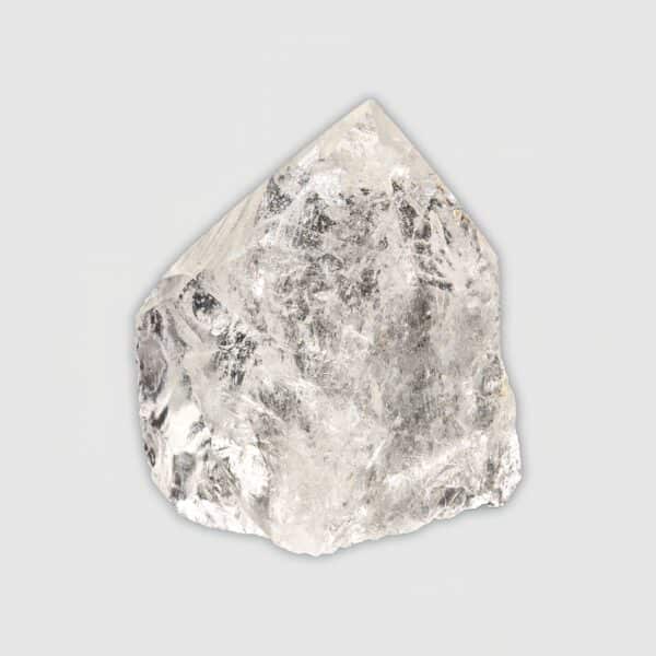 Point made from natural crystal quartz gemstone with polished top and a height of 7cm. Buy online shop.