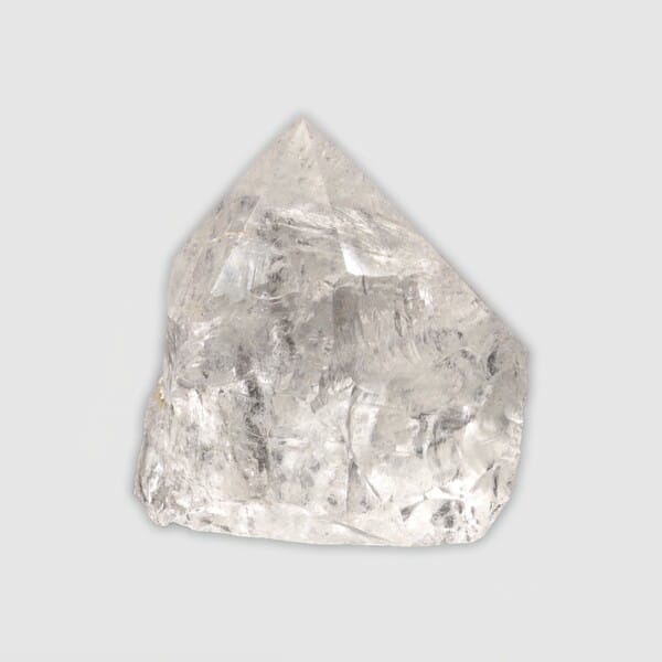 Point made from natural crystal quartz gemstone with polished top and a height of 7cm. Buy online shop.