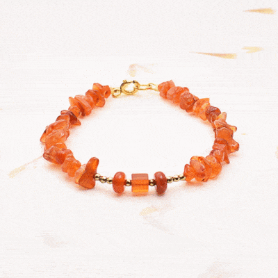 Handmade bracelet made of natural carnelian and pyrite gemstones. The bracelet has a clasp made of gold plated sterling silver. Buy online shop.