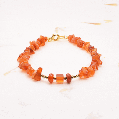 Handmade bracelet made of natural carnelian and pyrite gemstones. The bracelet has a clasp made of gold plated sterling silver. Buy online shop.