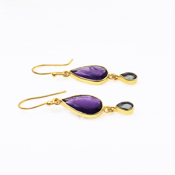 Handmade long gold plated sterling silver earrings with natural teardrop shaped amethyst and blue topaz gemstones. Buy online shop.