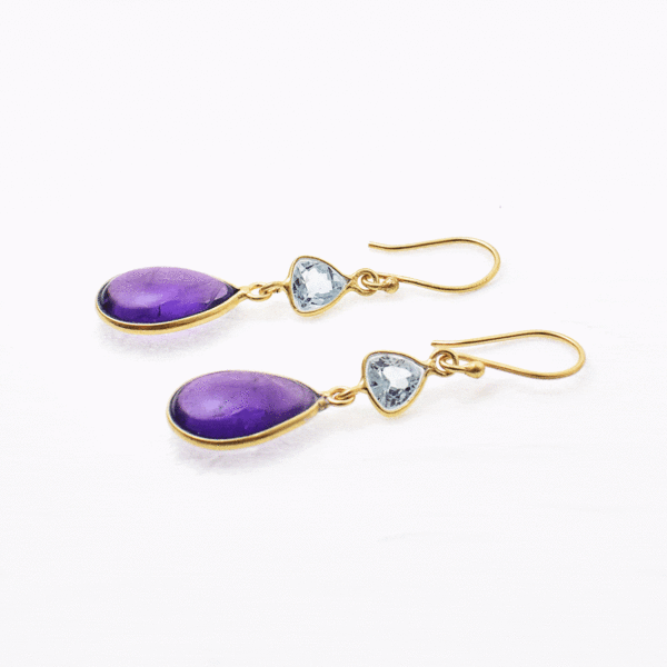 Handmade long gold plated sterling silver earrings with Amethyst natural gemstones in drop shape and blue topaz in triangle shape. Buy online shop.