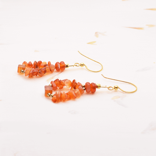 Handmade teardrop shaped earrings made of gold plated sterling silver with natural carnelian gemstones in grommet, irregular & square shape and pyrite in spherical shape respectively. Buy online shop.