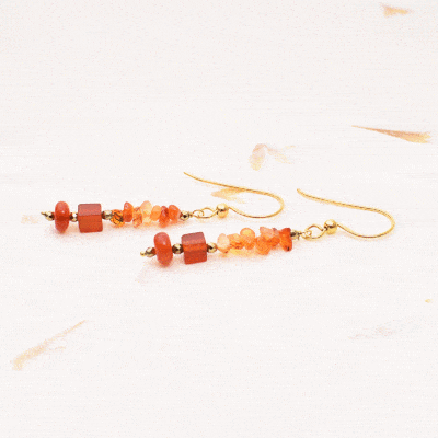 Handmade earrings made of gold plated sterling silver with natural carnelian gemstones in grommet, irregular & square shape and pyrite in spherical shape respectively. Buy online shop.