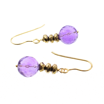 Handmade earrings made of natural amethyst and pyrite gemstones, decorated with gold plated silver elements 925. Buy online shop.