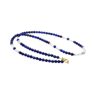 Handmade necklace made of natural, faceted lapis lazuli and blue topaz gemstones, in a spherical shape. The necklace has a pearl on its center and gold plated sterling silver decorative elements. Buy online shop.