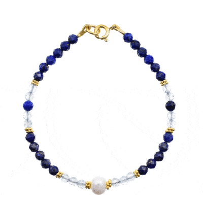 Handmade bracelet made of natural, faceted lapis lazuli and blue topaz gemstones, in a spherical shape. The bracelet has a pearl on its center and gold plated sterling silver decorative elements. Buy online shop.