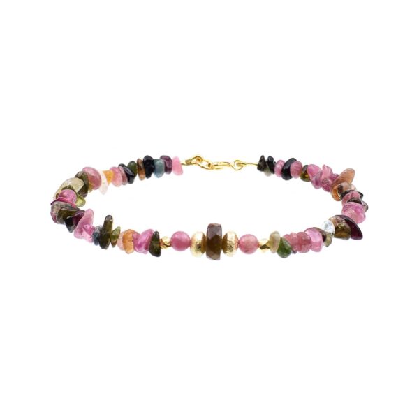 Handmade bracelet with irregular and spherical shaped natural tourmaline gemstones in different colors. The bracelet has a faceted Tourmaline wheel in the center and gold plated sterling silver decorative elements. Buy online shop.